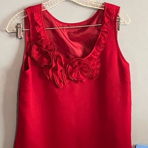 SELLING TOP FOR WOMEN COLOR RED SIZE XS SLEEVELESS BRAND # UNAMED PRE-OWNED